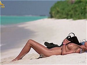 fantastic Bo Derek flashing off her fur covered fuckbox at the beach